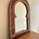 Large vintage mirror in studded leather and brass