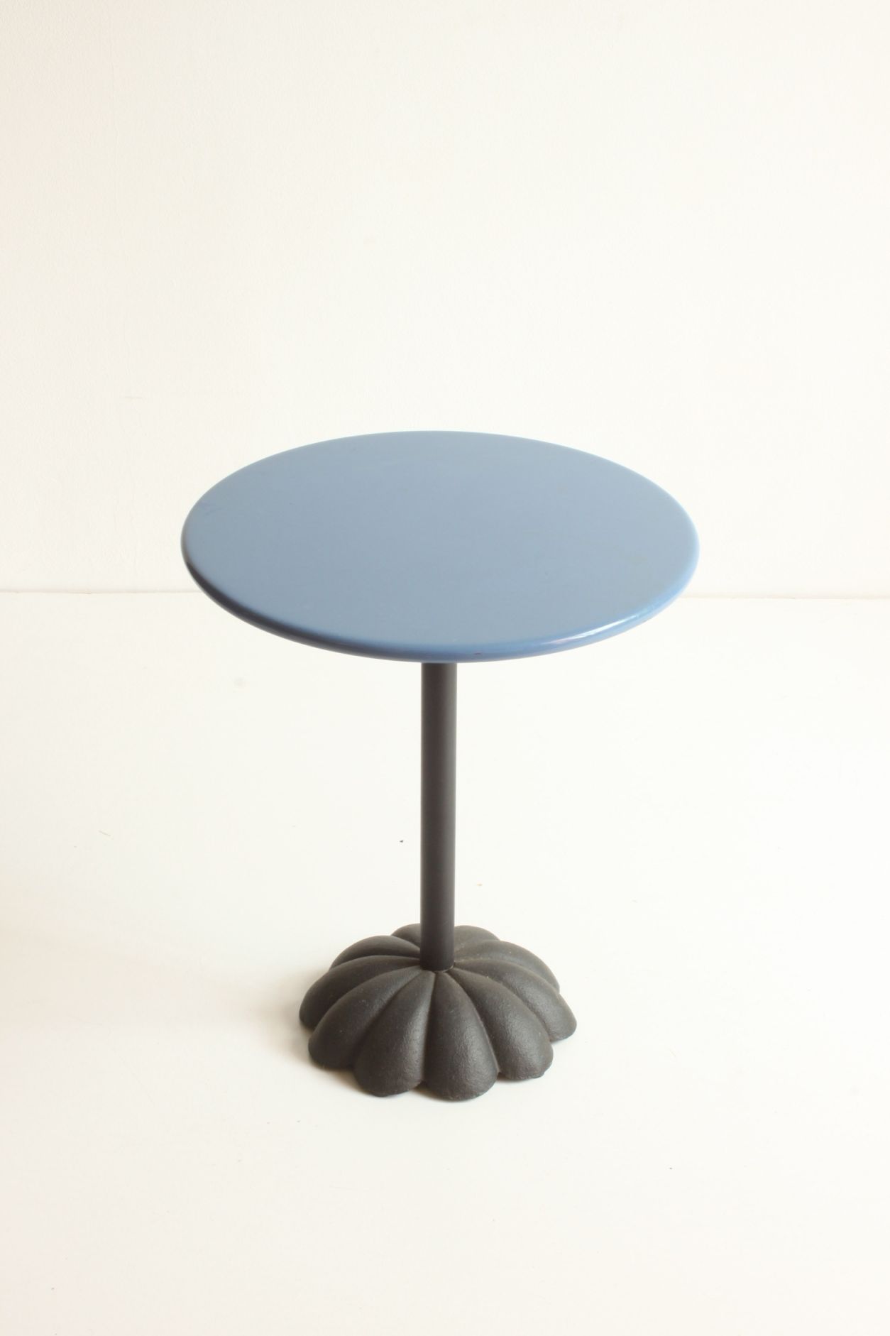 Postmodern cast iron flower base adjustable round side tables, blue and green, 1980s.