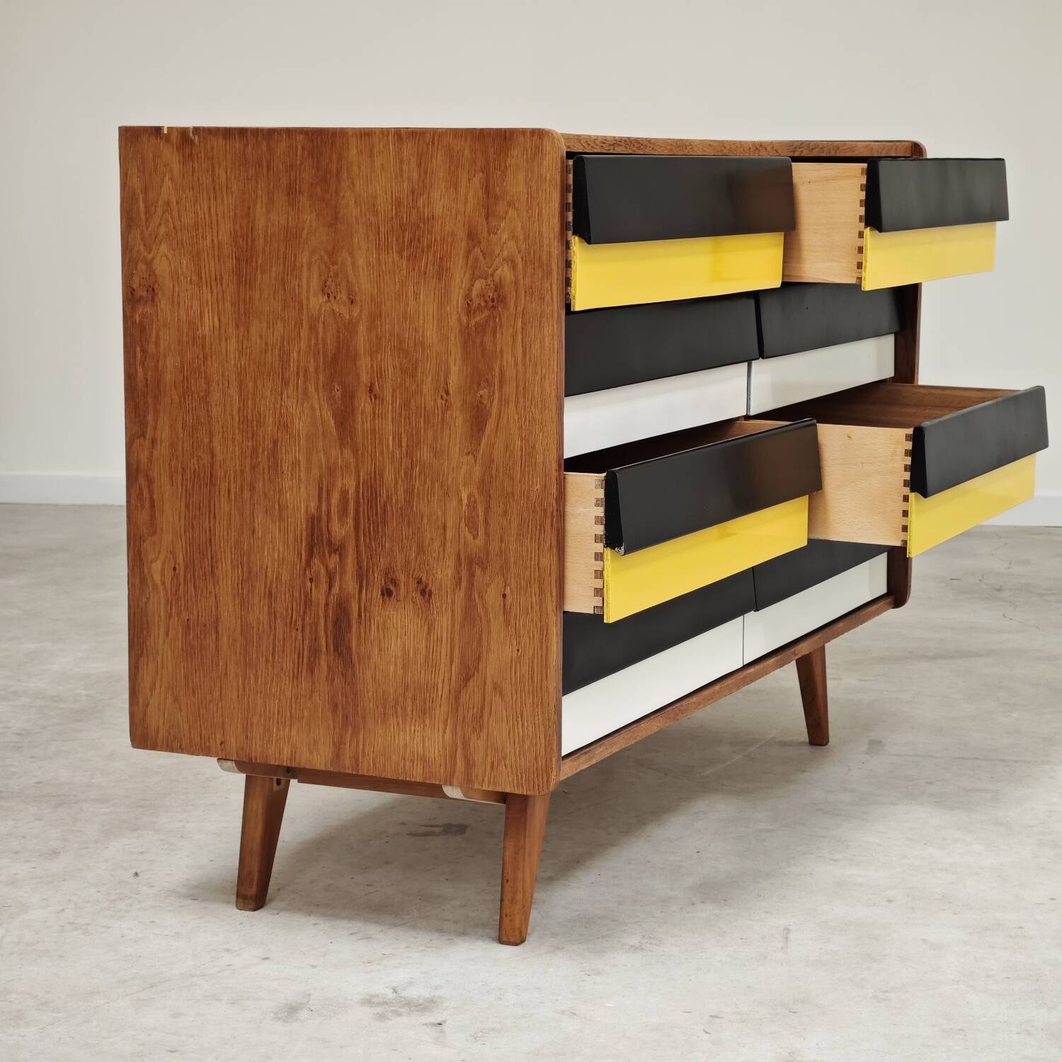 U453 yellow 8-drawer wooden sideboard by Jiri Jiroutek for Interier Praha 1960