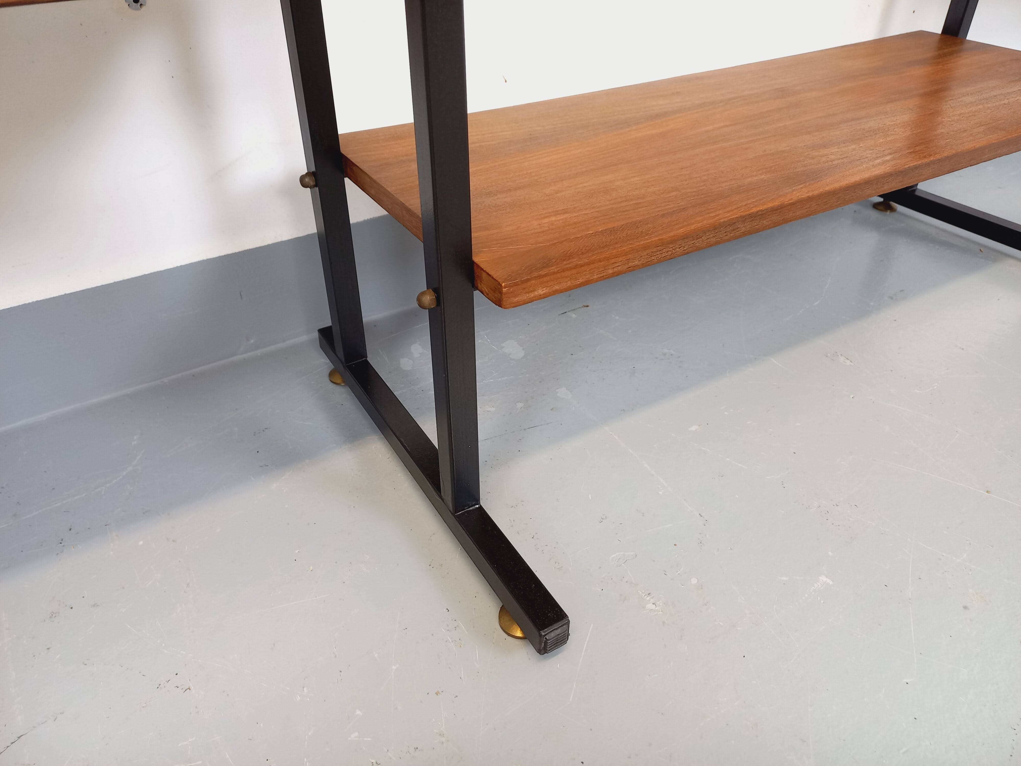 Vintage Italian triple modular bookshelf in teak and metal.