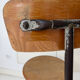 Vintage workshop chair in metal and wood, industrial style.