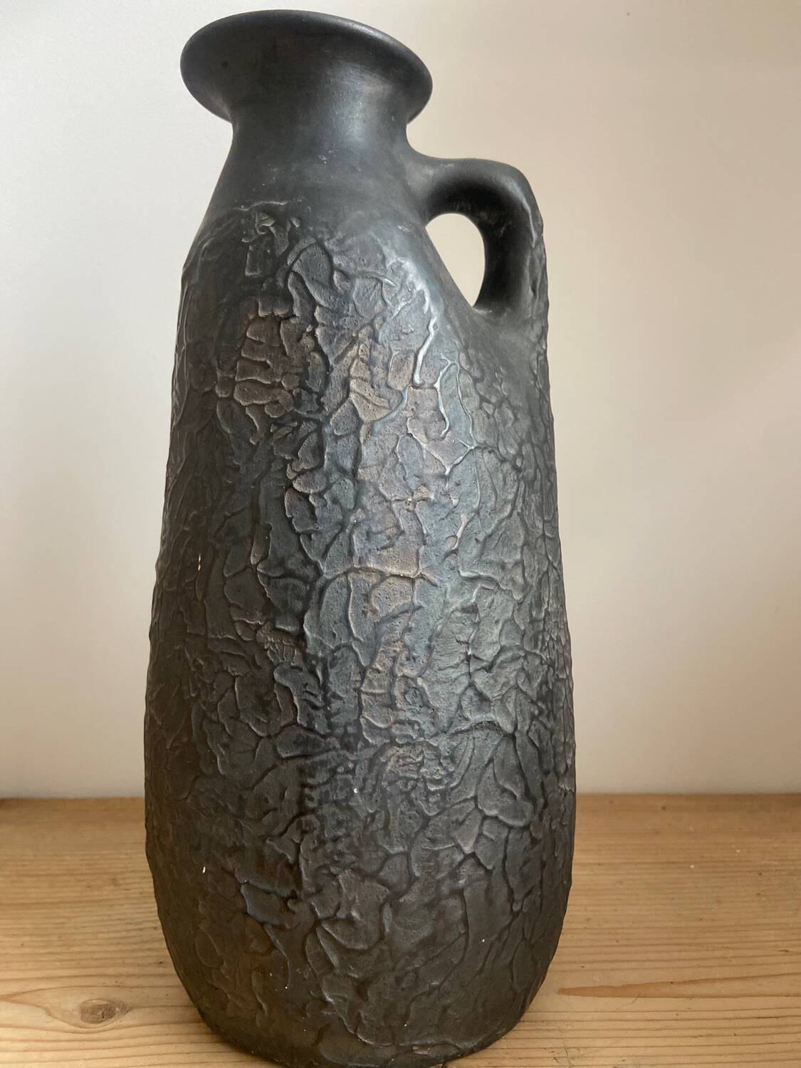 Black ceramic pitcher from the 50s