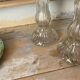 Paire de bougeoirs en verre flacons roger gallet