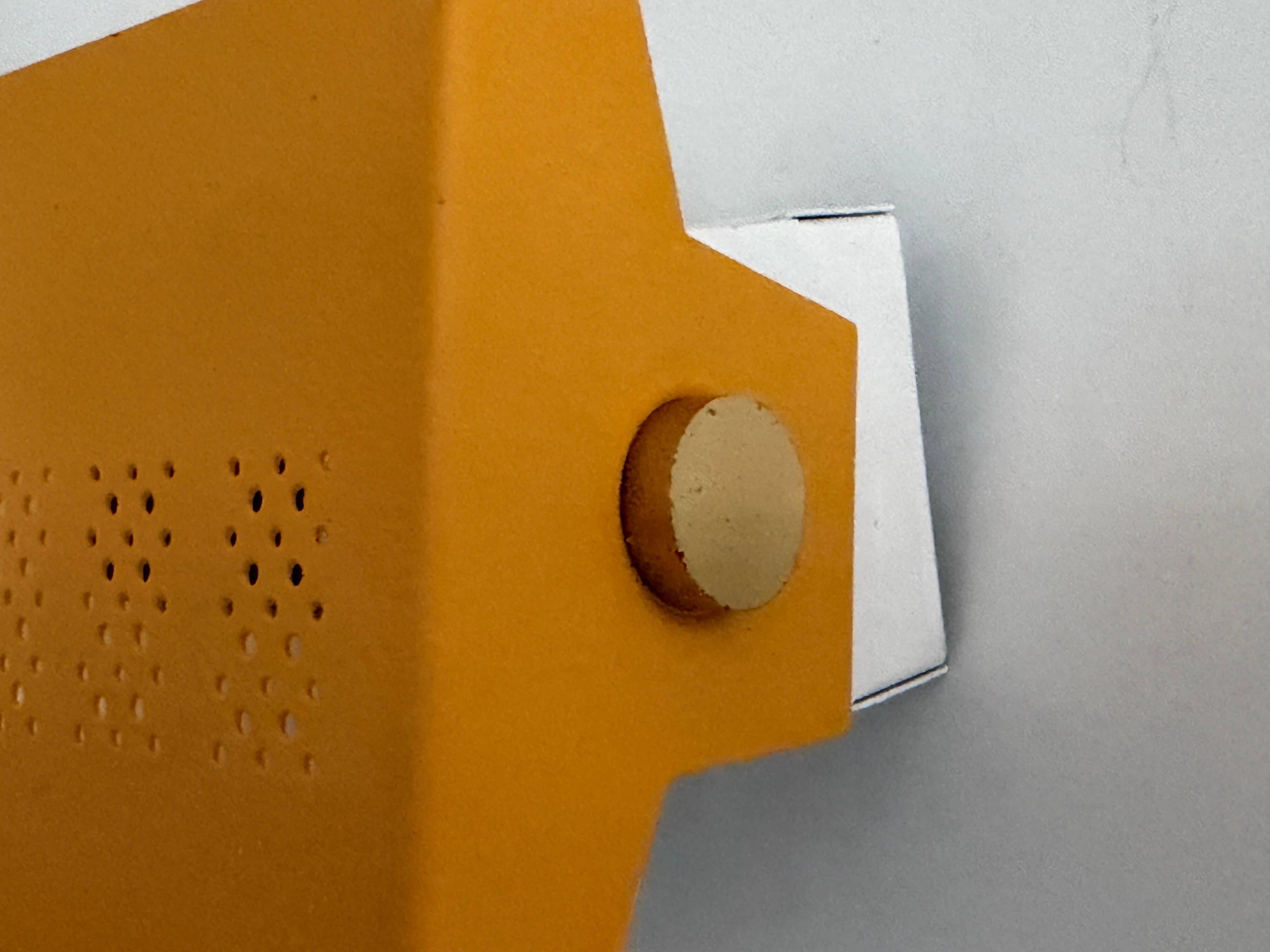 Pair of yellow metal wall lights from the mid-century by N Leuchten, 1960s, Germany.