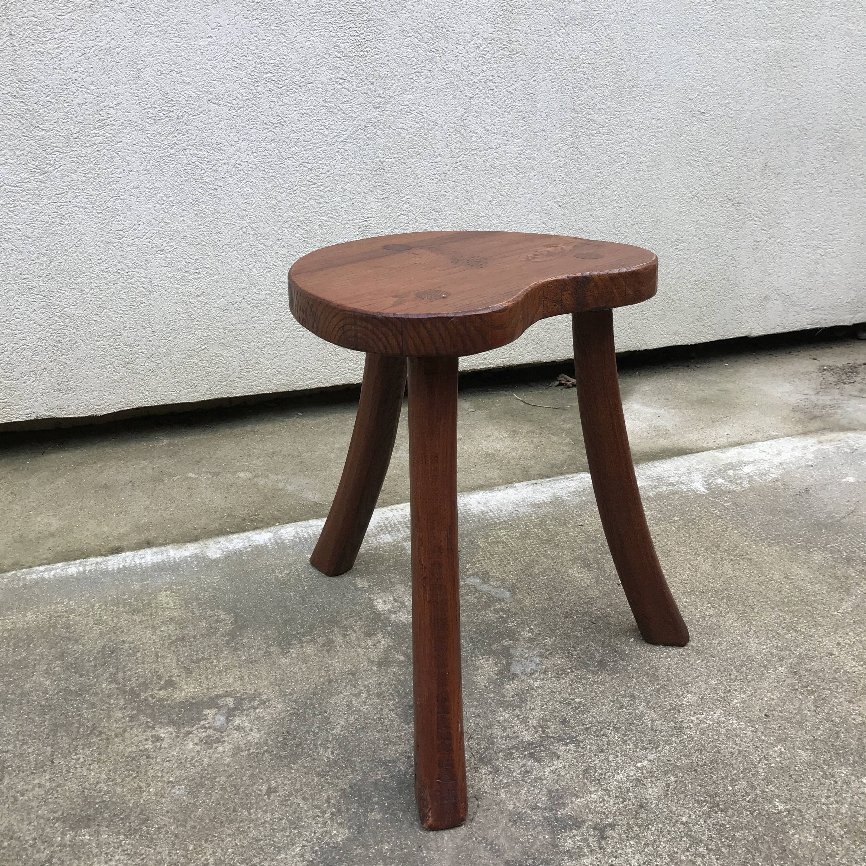 Brutalist tripod standing farm stool