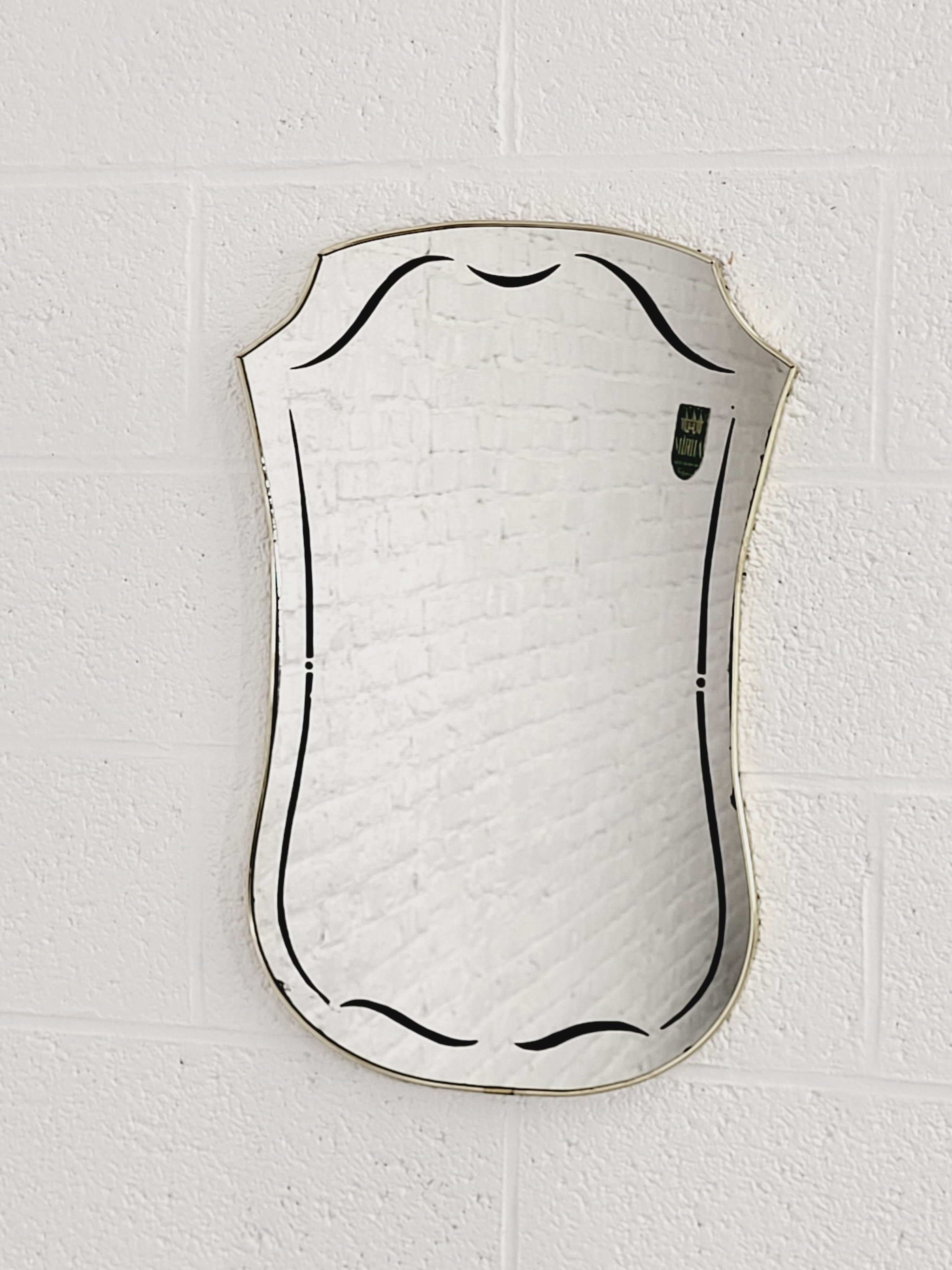 Rearview mirror and screen-printed free-form 60s on gilded frame