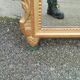 Antique gilded wooden mirror in Louis XVI style