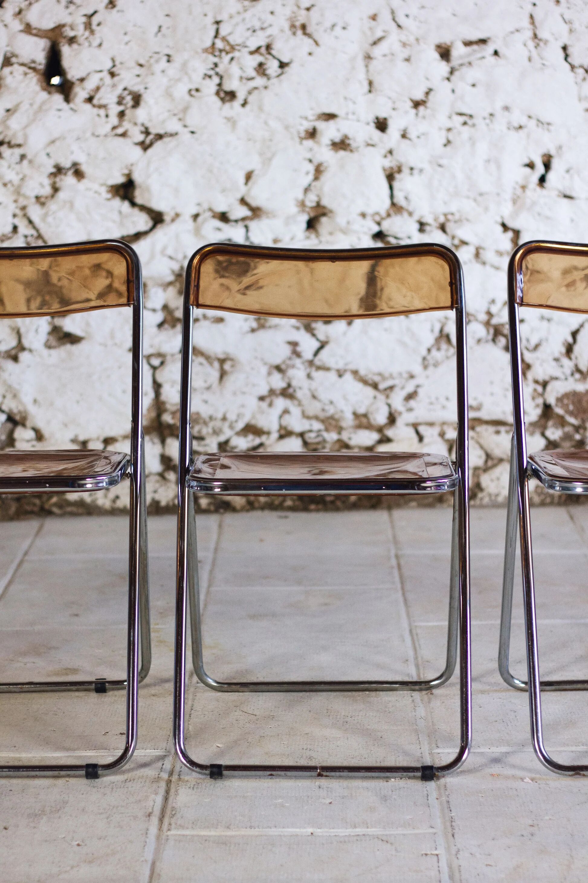 Set of 3 folding chairs in plexiglass and chrome, 1970.