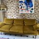 Mustard yellow retro three-seater sofa