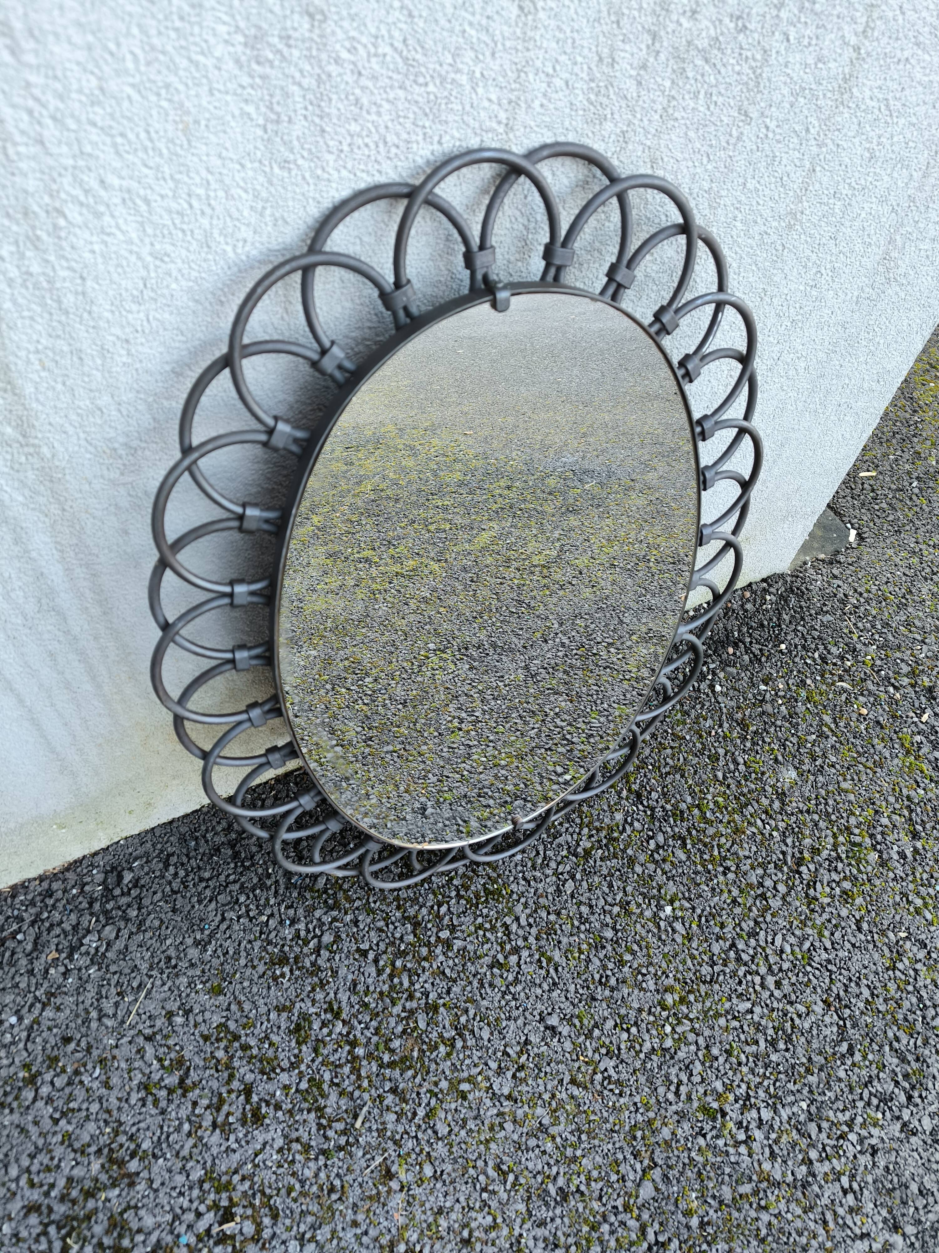 Oval metal mirror