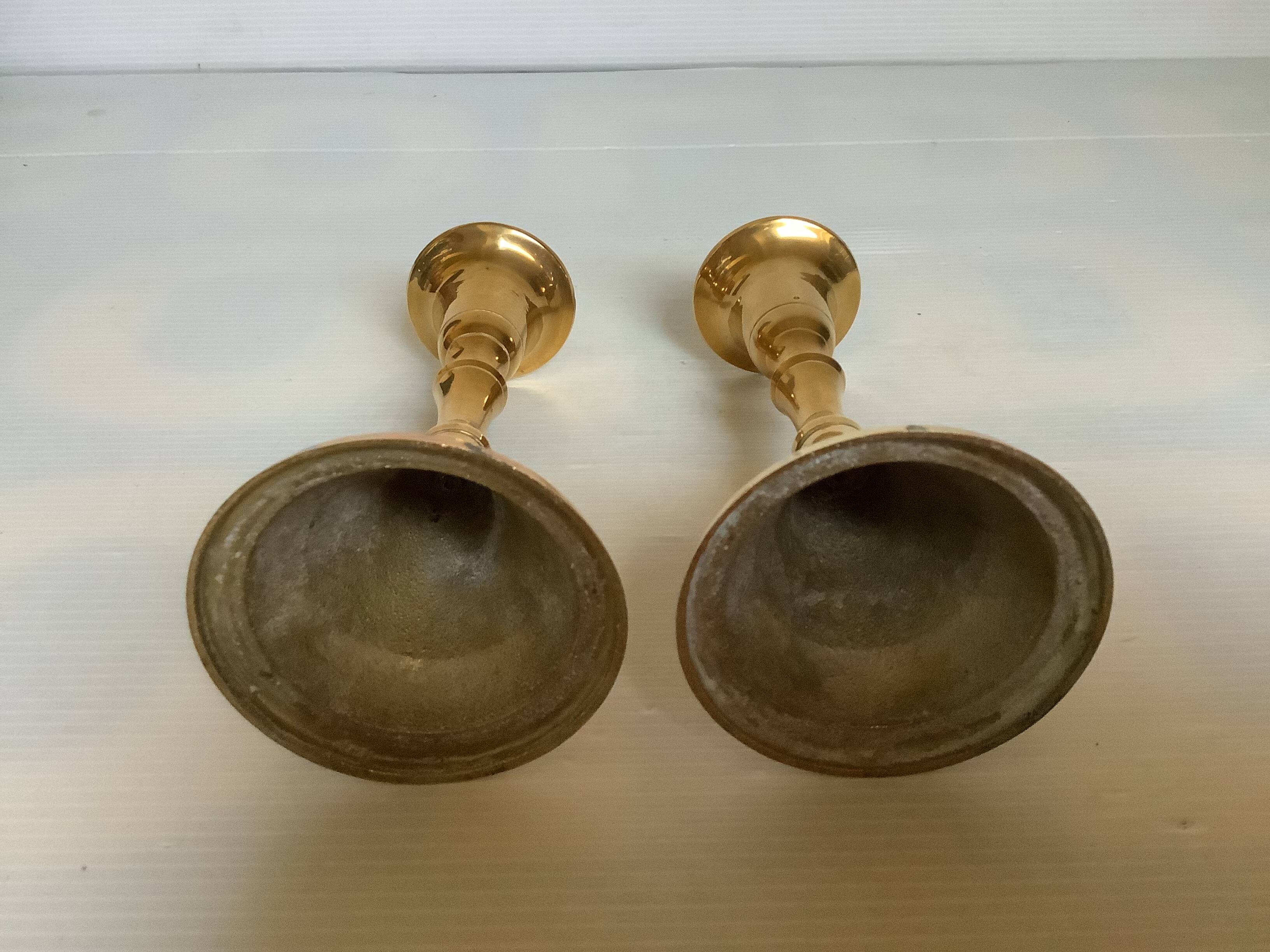 Pair of small brass tulip-shaped candlesticks