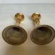 Pair of small brass tulip-shaped candlesticks
