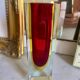 Small red vase made of Murano glass.