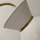 1950 floor lamp rises downwards in diabolo brass