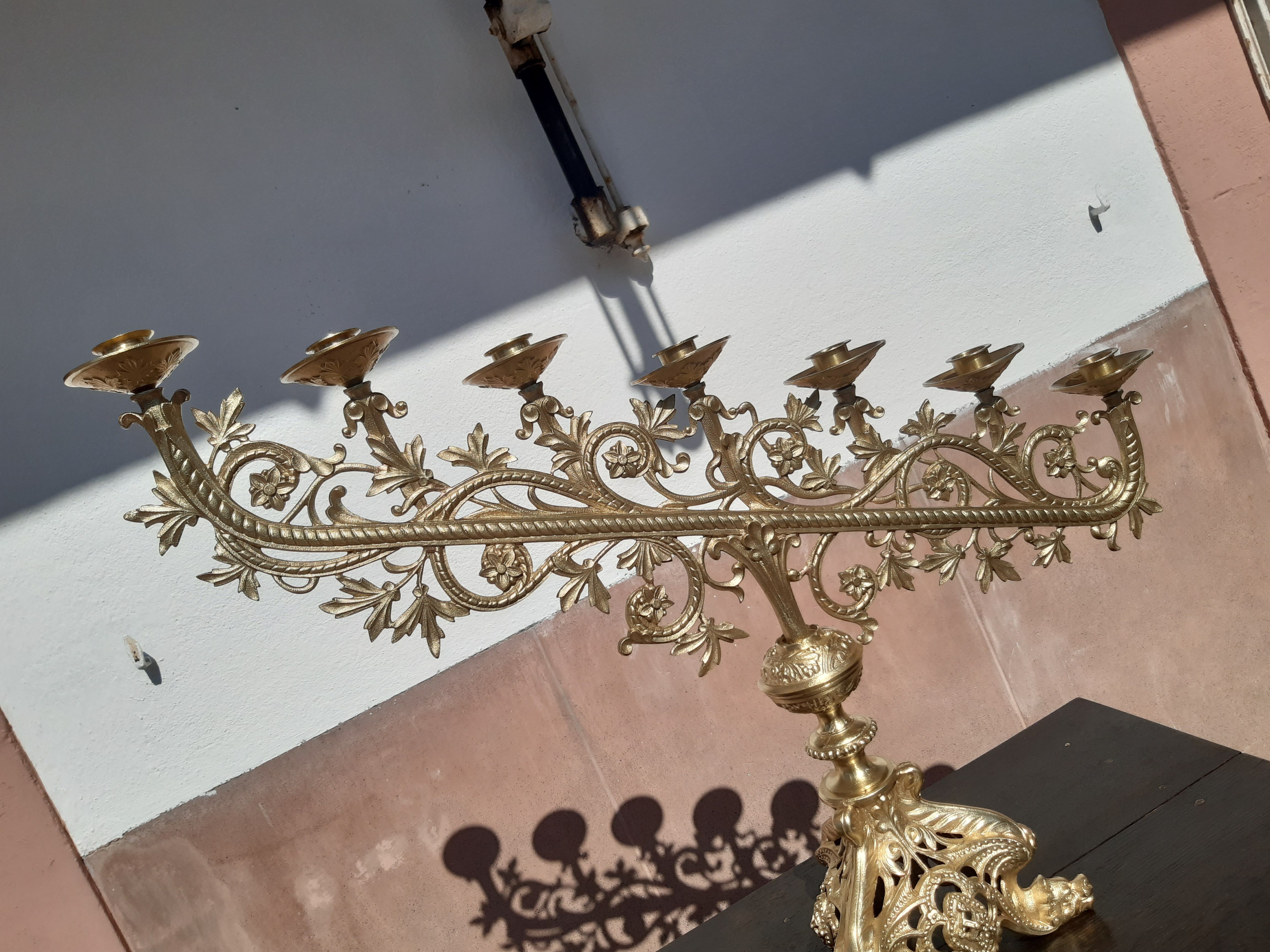 Antique candle holder in bronze and brass nineteenth century.