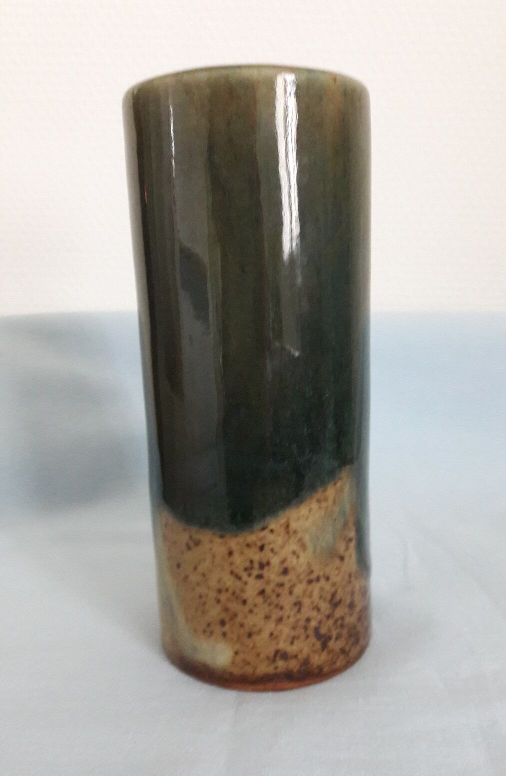 Signed sandstone roll vase