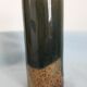 Signed sandstone roll vase