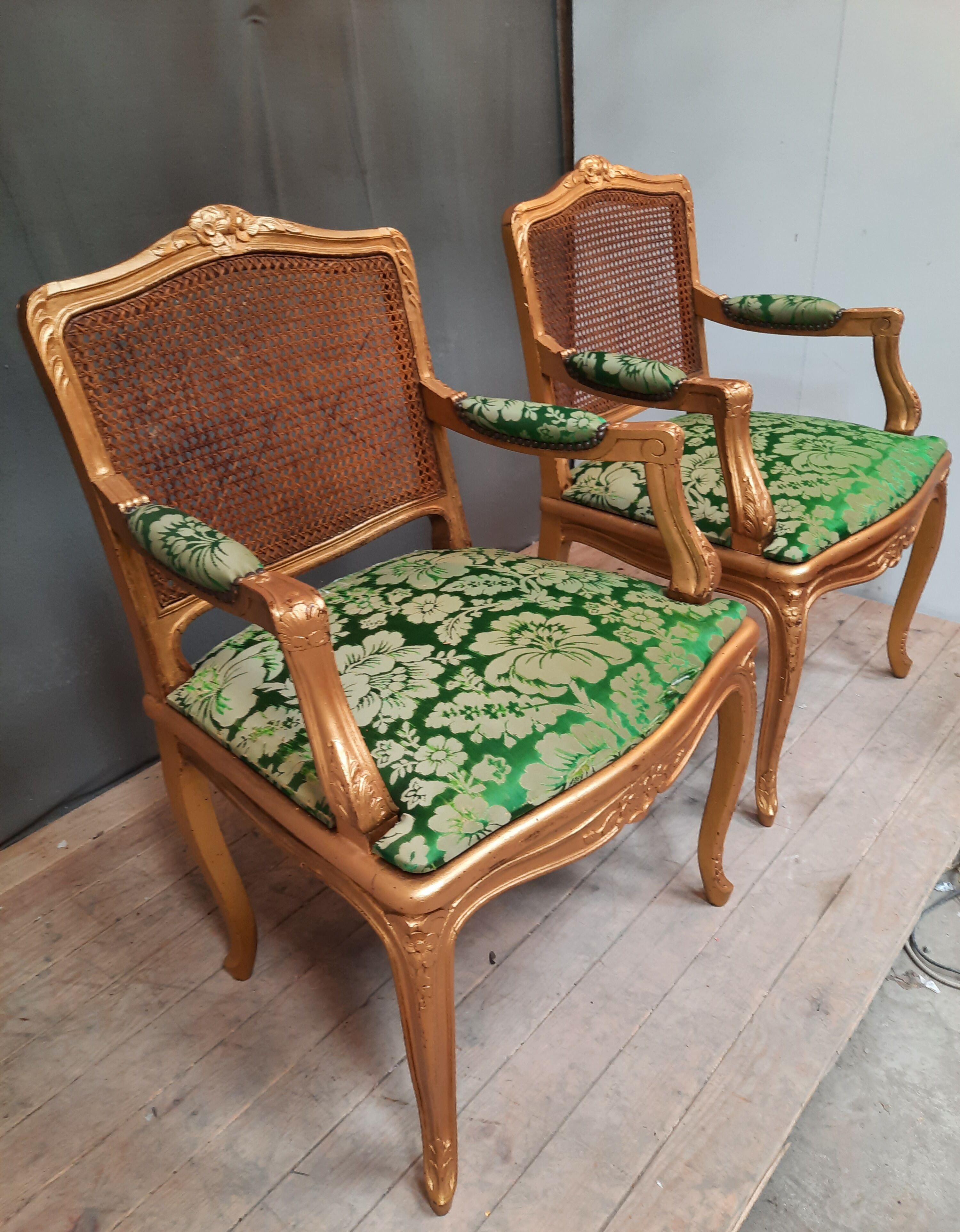Louis XV-style golden armchair pair