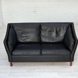 1970s, Danish 2-seater sofa, original black furniture leather, teak wood.