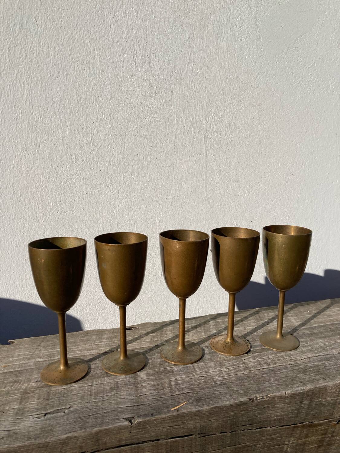 Copper brass stemmed glasses