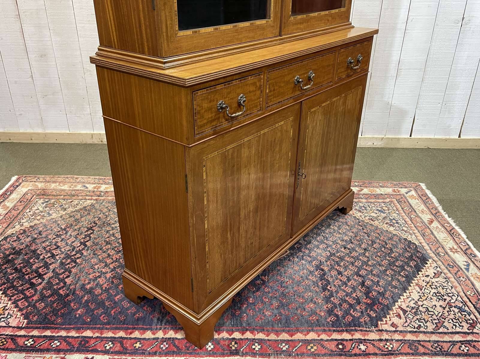 English two-piece mahogany bookcase from the 1950s
