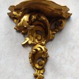Baroque style golden shelf.