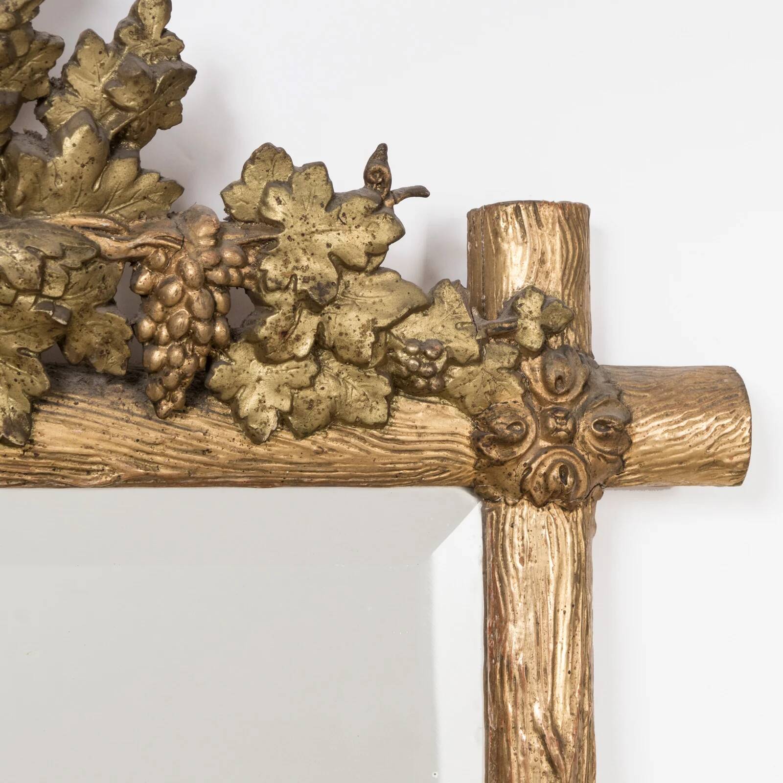 Antique faux wood mirror with bird's nest, 19th century