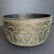 Carved bronze cup