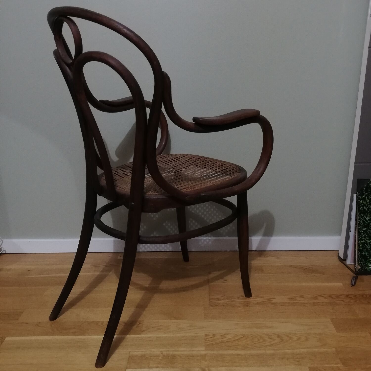 Canned armchair in curved wood signed J.Kohn