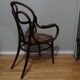 Canned armchair in curved wood signed J.Kohn