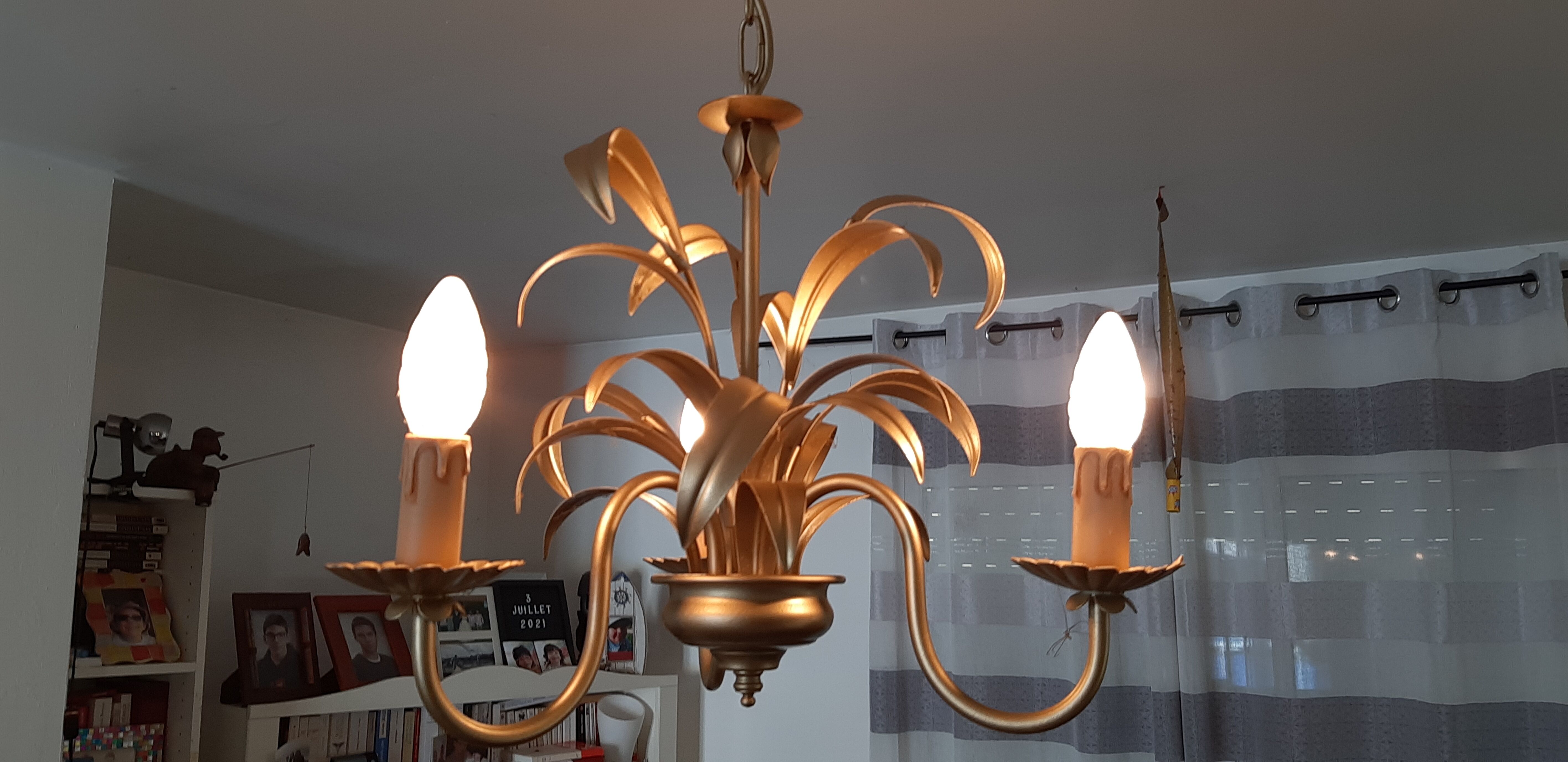 Vintage chandelier in golden metal