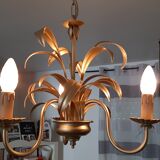 Vintage chandelier in golden metal