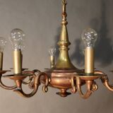 Bronze chandelier with double patina and 8 light arms.