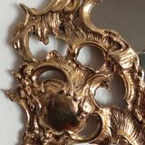 Antique mirror in gilded metal