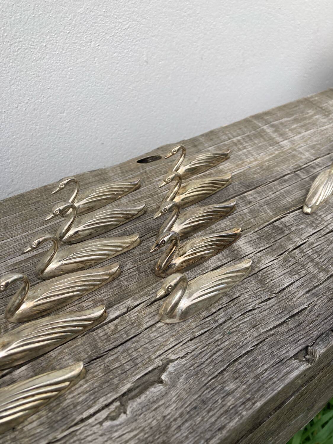 12 duck knife holders in silver metal
