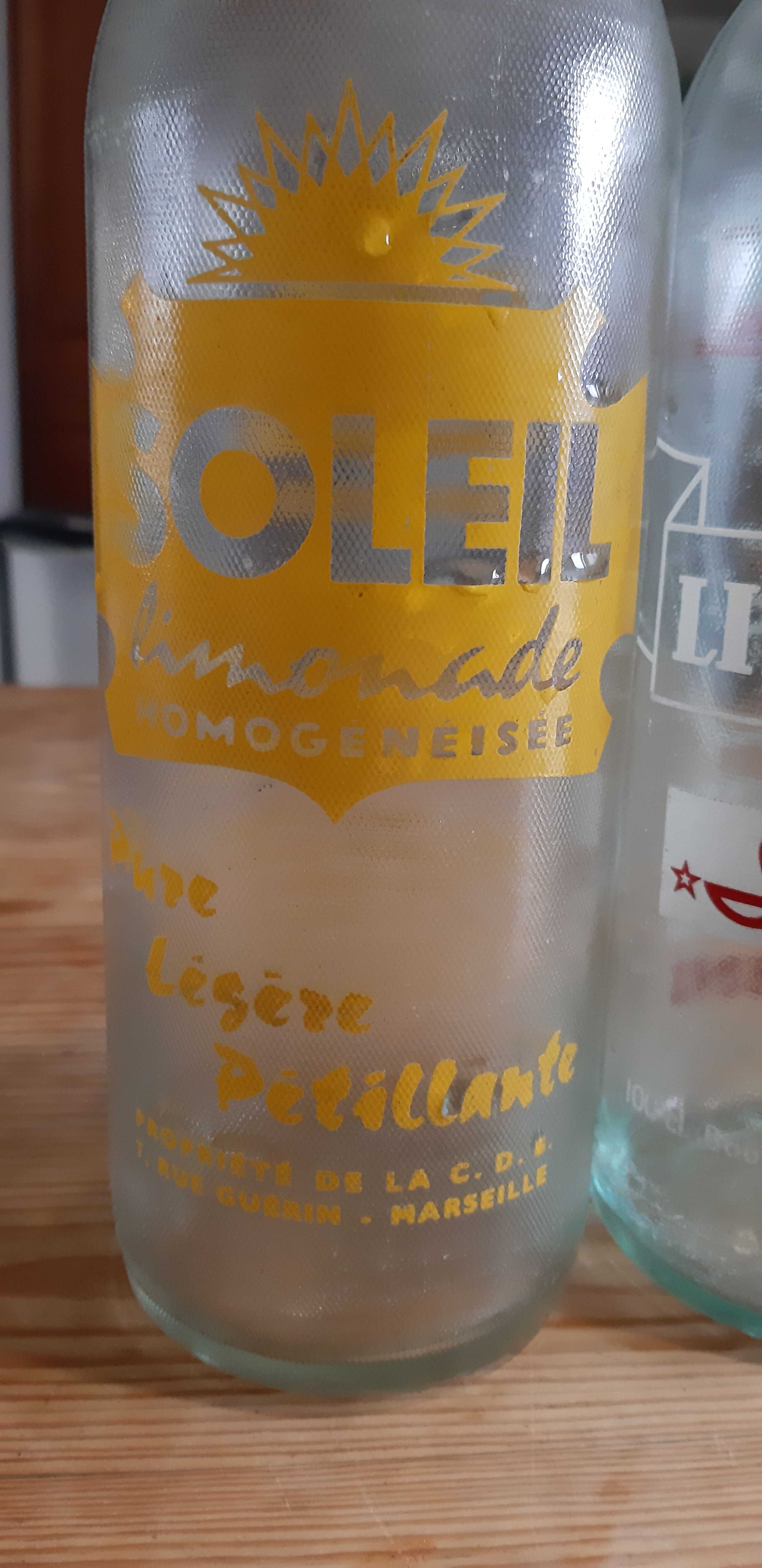 2 bottles of vintage lemonade from the 50s in glass