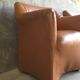Pair of convertible armchairs in cognac leather - vintage 1970