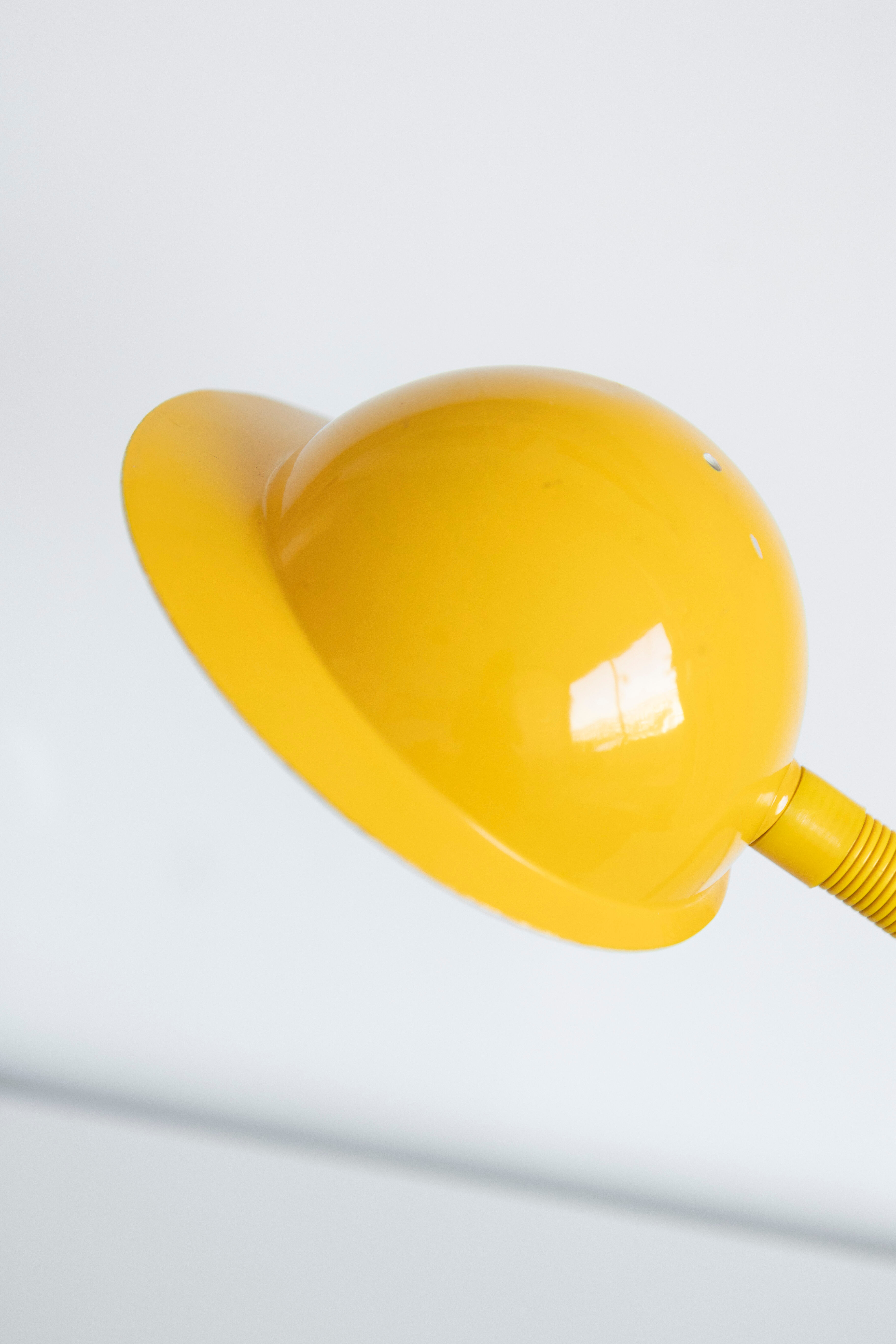 Vintage aluminor desk lamp 80 with metal yellow cap