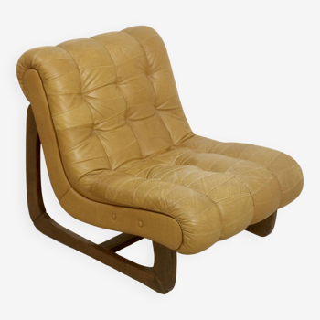 Fauteuil en cuir camel  année 60.