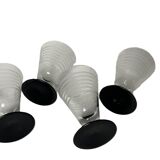 Art Deco, four striped liqueur glasses on black stem circa 1930