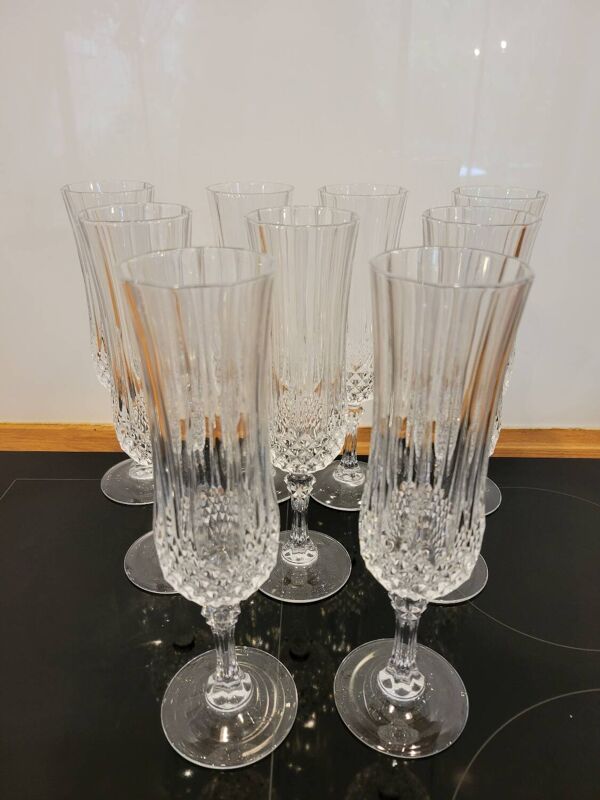9 flûtes à champagne en cristal d'Arques modèle Longchamp
