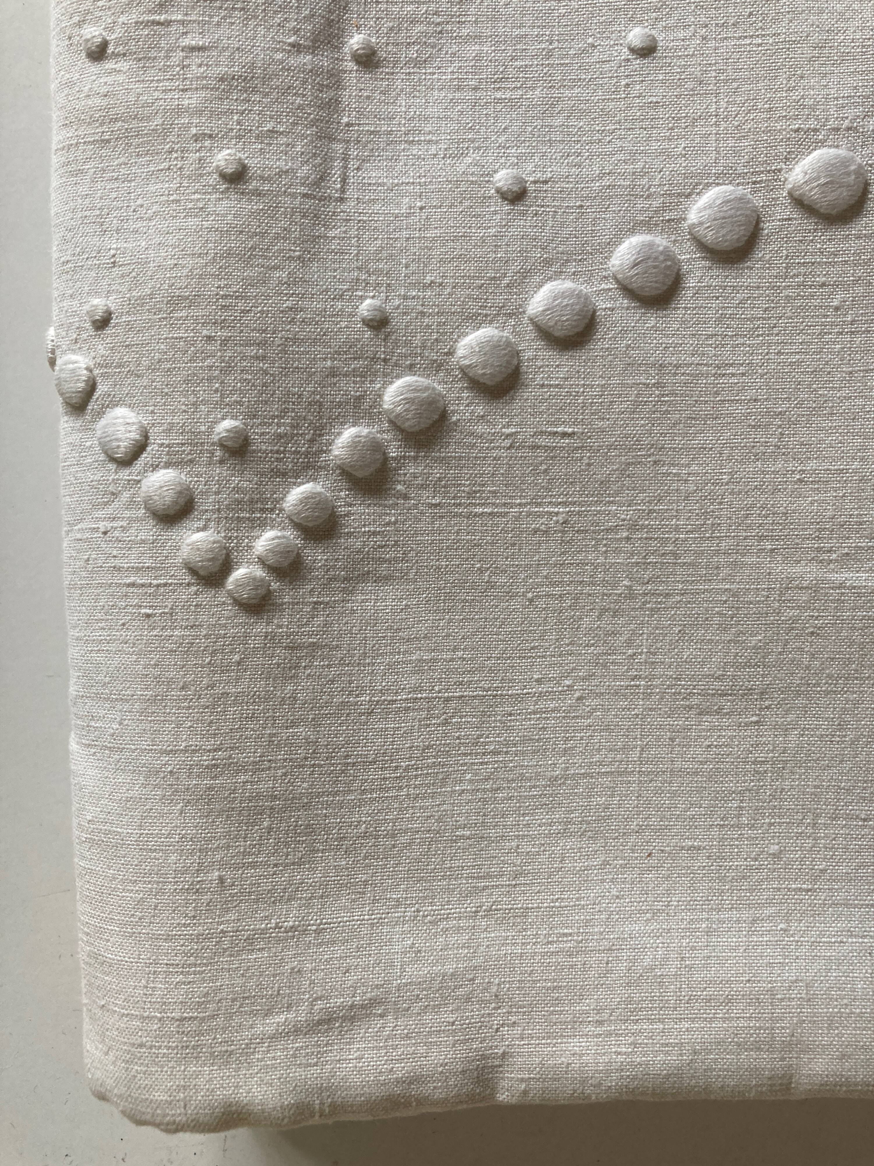 Linen cloth sheet embroidered with a pea festoon