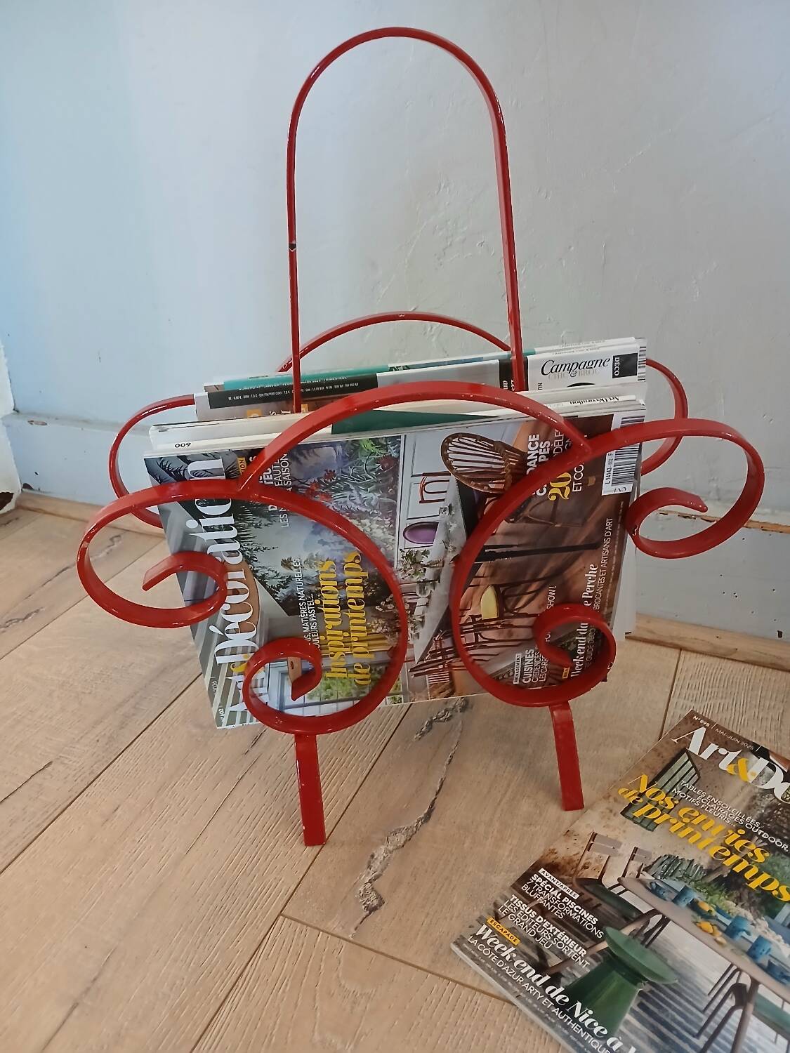 Vintage wrought iron magazine rack