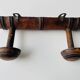 Wooden wall-mounted coat rack with two hooks