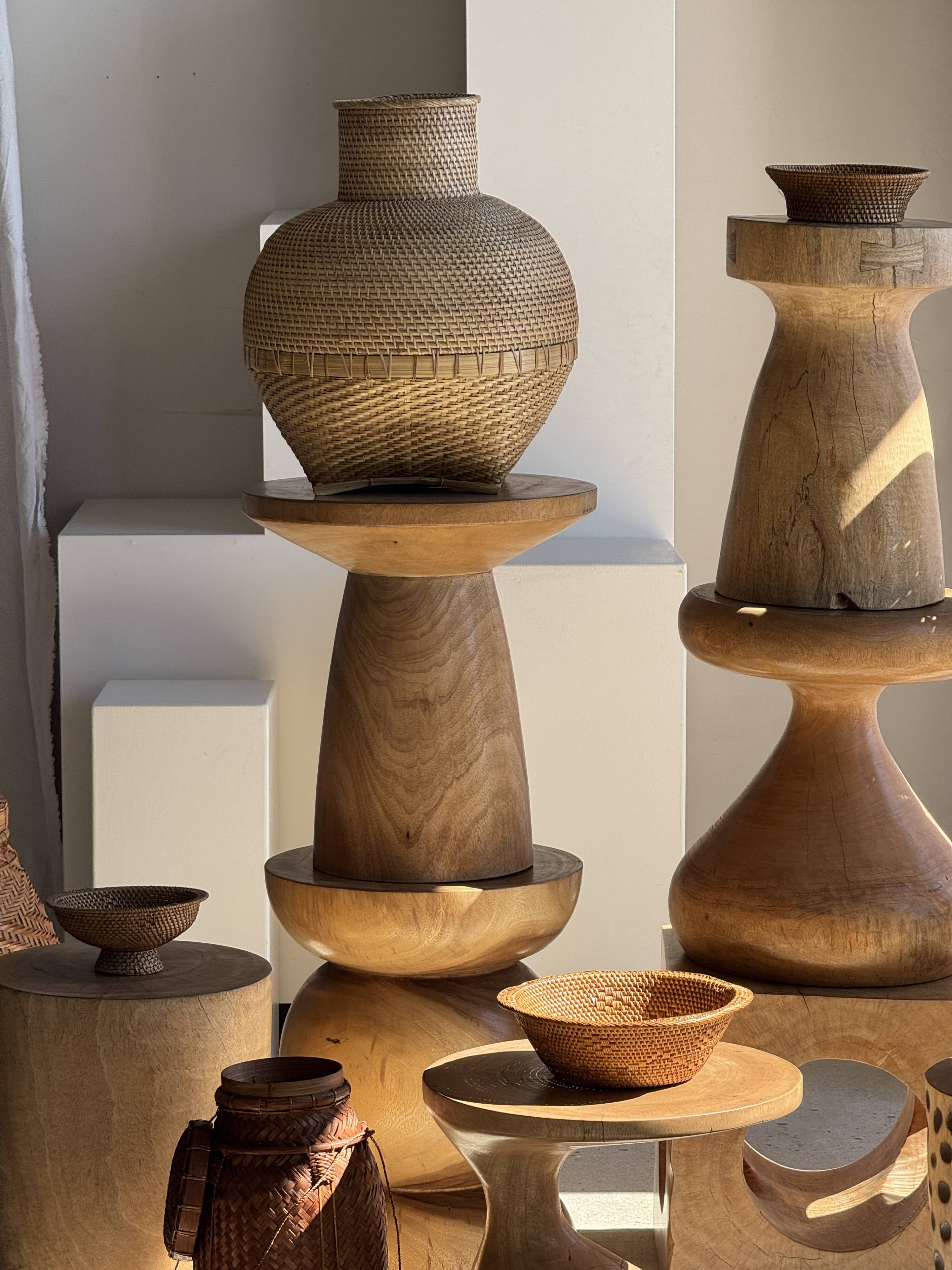 Natural solid mango side table (monoxyle) with conical legs.