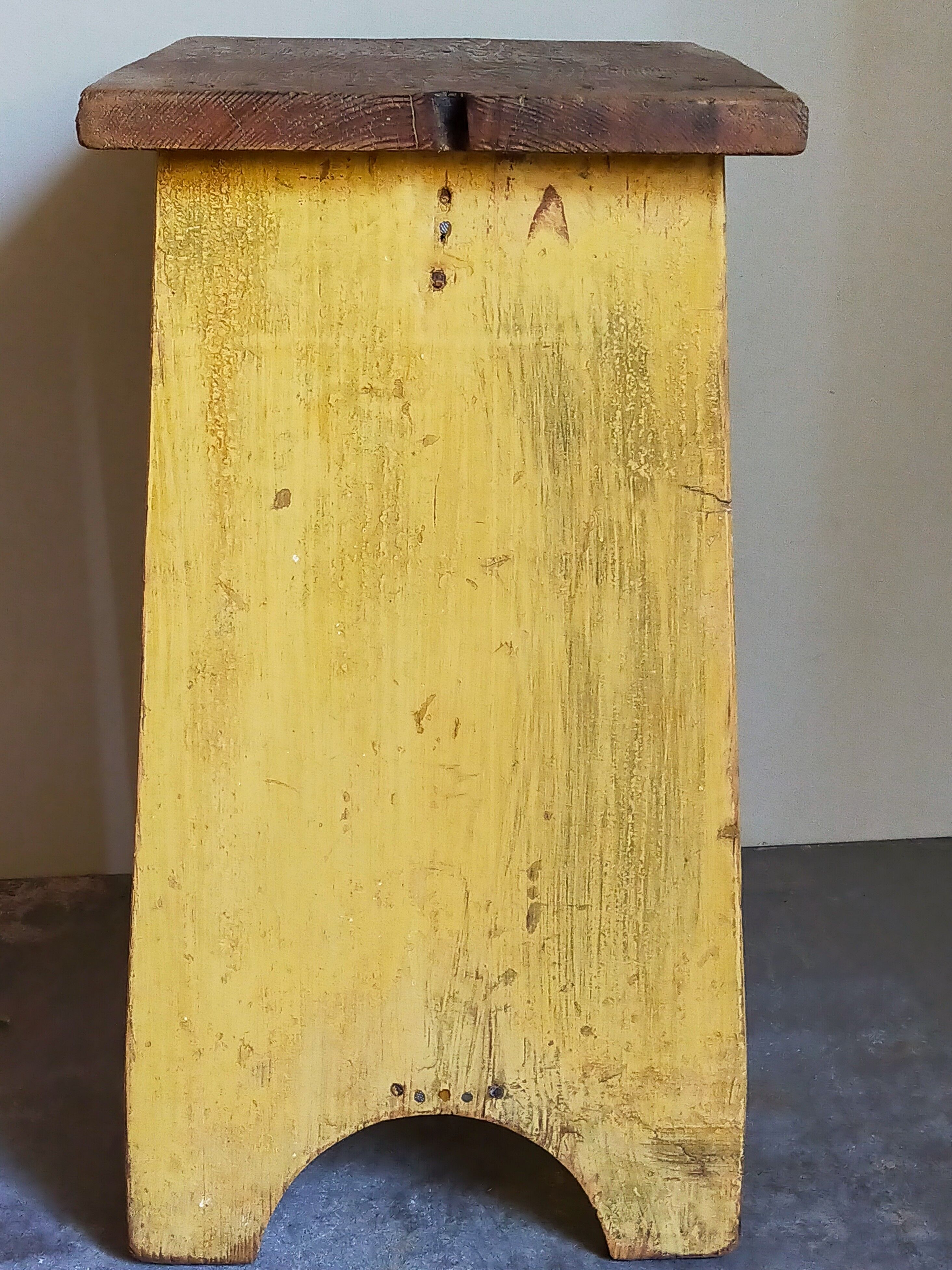 Art-populaire workshop stool in patinated painted wood