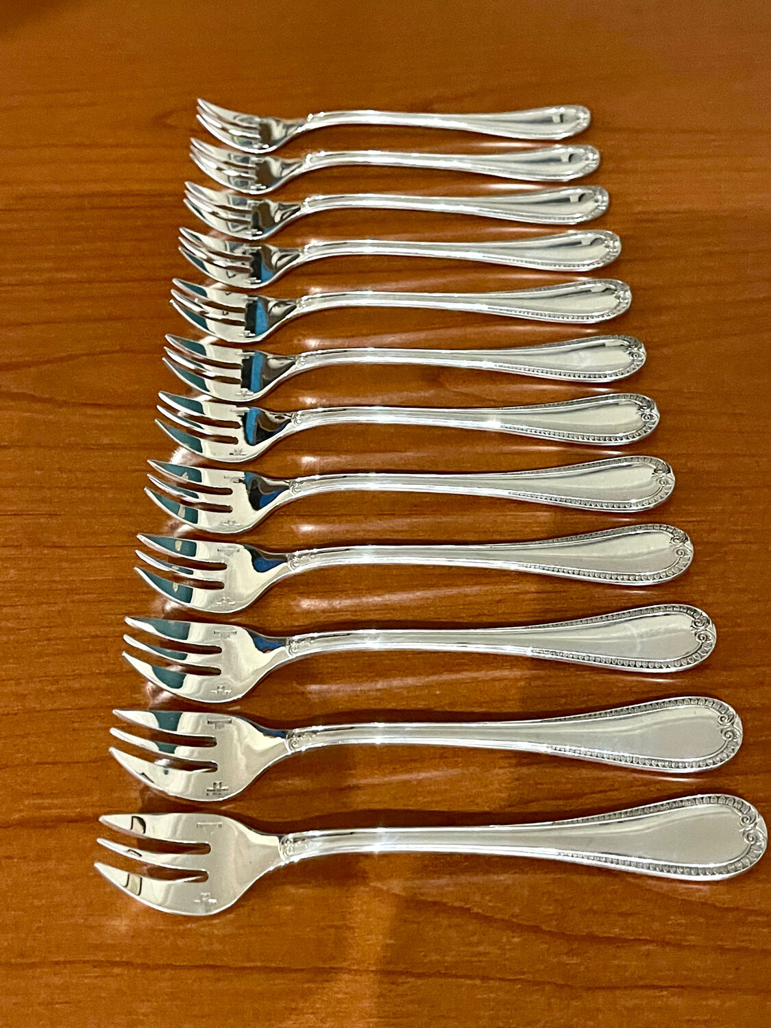 Christofle Malmaison 12 oyster forks, new condition