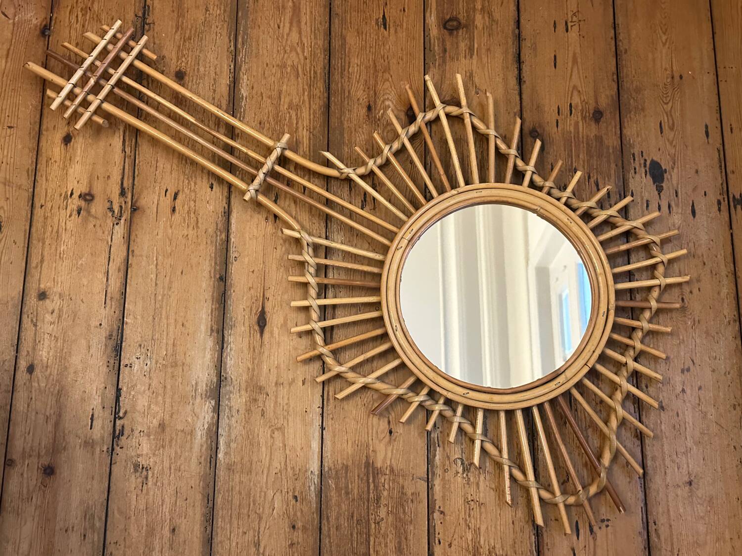 The vintage guitar rattan mirror.