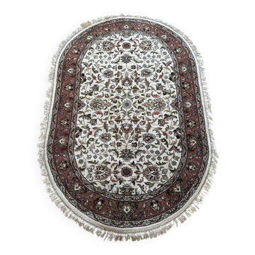 Handmade oval Persian rug 185cm x 120cm