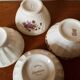 Set of 12 mismatched porcelain bowls